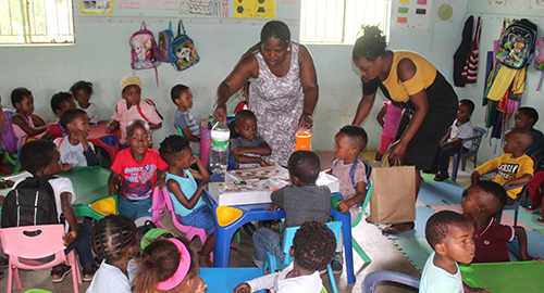 Kids excited to receive their Santa Shoeboxes